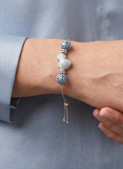 Silence (Resonance) Kesi Bracelet worn by a model
