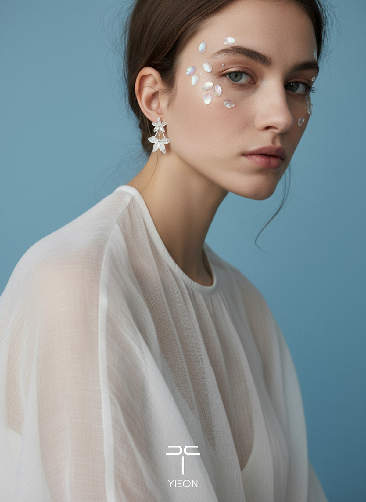 Stars silver filigree ear studs worn on the ear