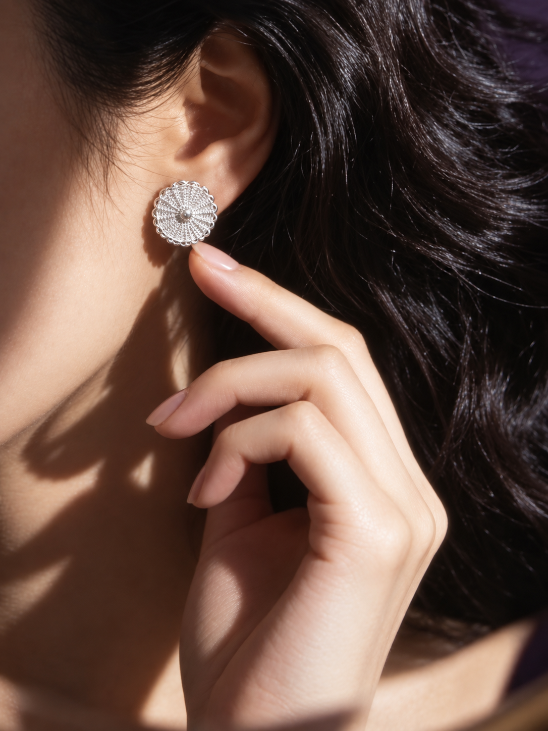 Halo (Sun) Filigree Inlay Earring worn by a model