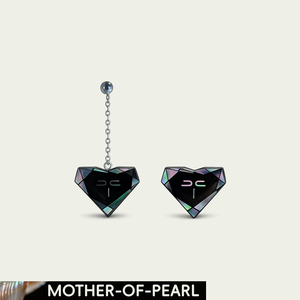 Iris asymmetric black jade earrings with mother-of-pearl inlay and a Mother-of-Pearl craft label