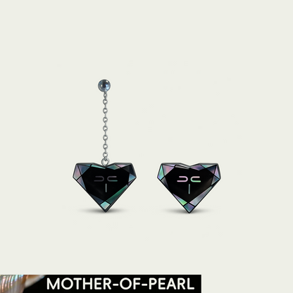 Iris asymmetric black jade earrings with mother-of-pearl inlay and a Mother-of-Pearl craft label