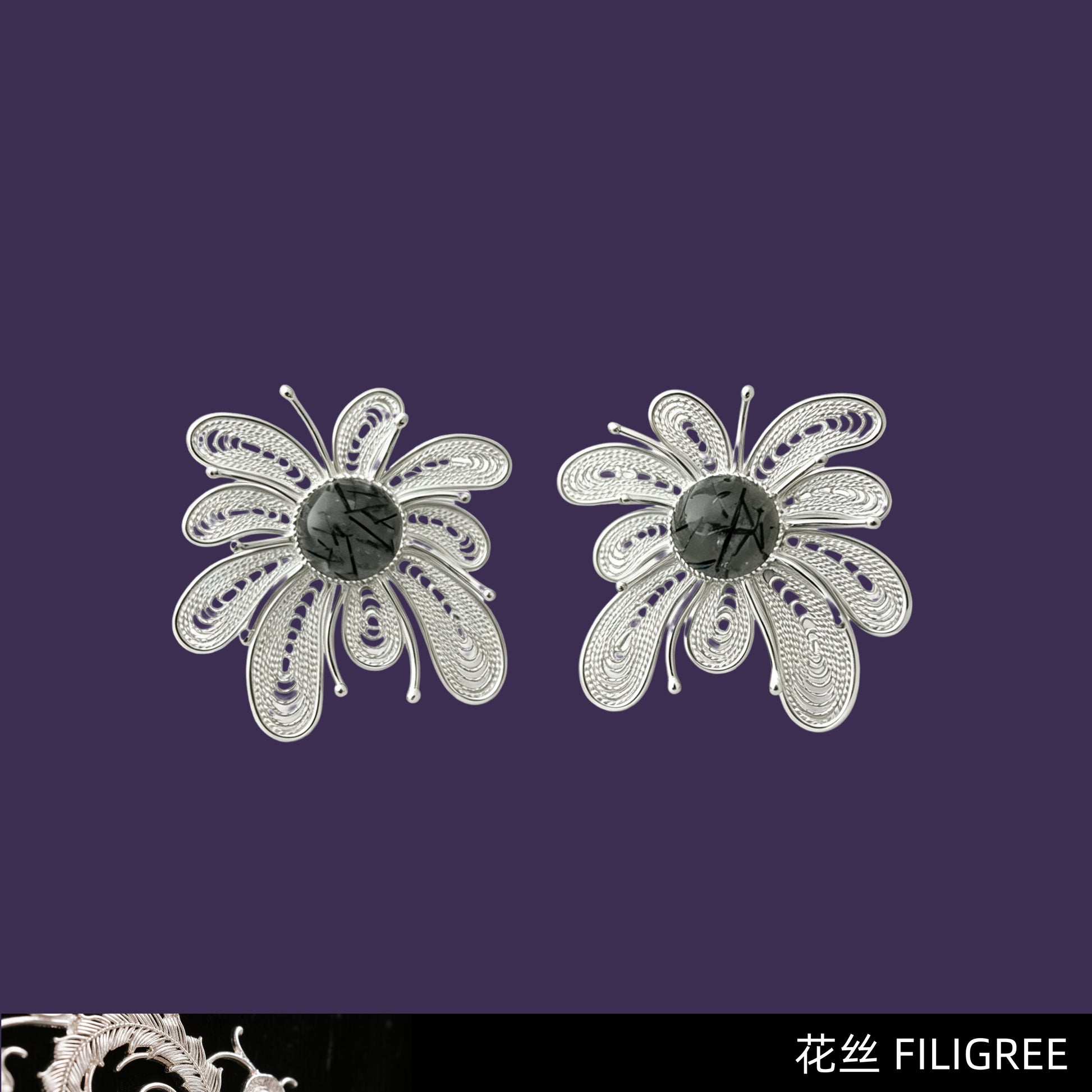 Pair of silver filigree firework earrings with black rutilated quartz centers